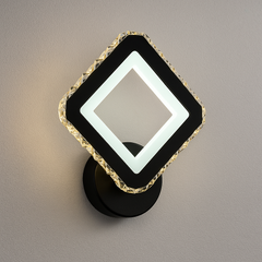 Aplica LED 19376/1W Negru+Crom 26W, montata in dormitor modern, lumina reglabila pentru ambient elegant si discret