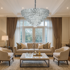 Candelabru rotund din cristal argintiu Ø800 mm, cu 16 surse E27, montat intr-un living cu tavan inalt si efect luxos