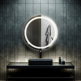 Oglinda LED rotunda 60 cm cu lumina rece, control tactil si sistem de dezaburire pentru baie moderna.