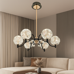 Candelabru LED negru cu accente aurii si 6 globuri, montat in living modern, lumina calda decorativa, stil contemporan