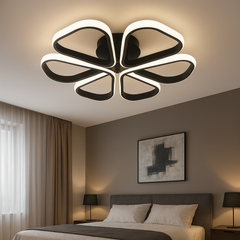 Lustra LED 77250/1 MB rotunda negru mat cu lumina ajustabila si telecomanda, instalata intr-un dormitor calm si modern.
